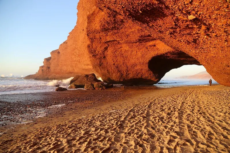 Red cliffs and arch at Legzira Beach