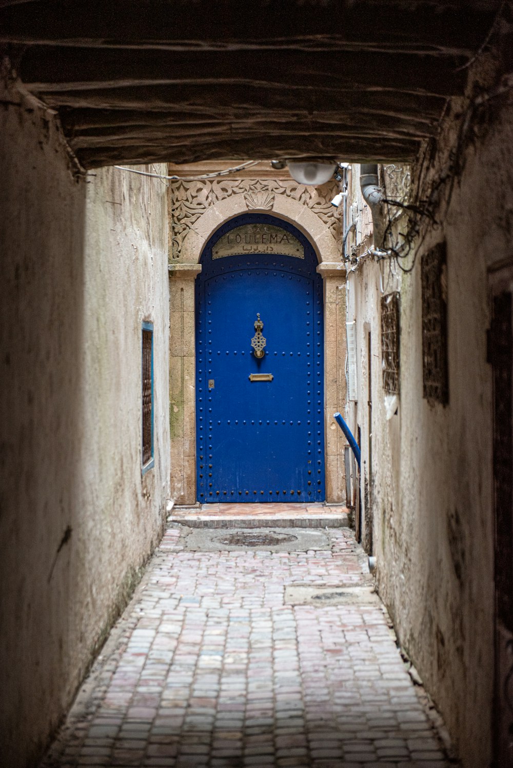 Blue doorway in an alley in Essaouira medina